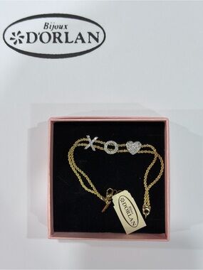 Vintage D'Orlan XO Heart Bracelet featuring a double-strand chain design.